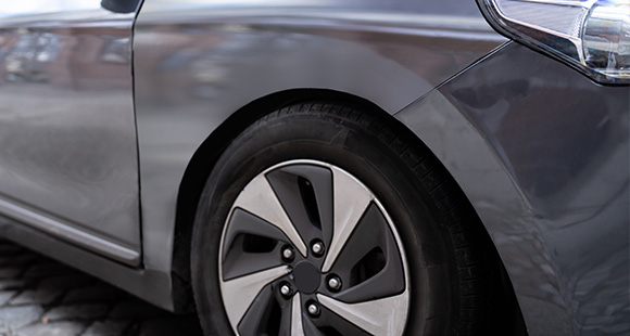 the side view of a pristine front bumper of a car